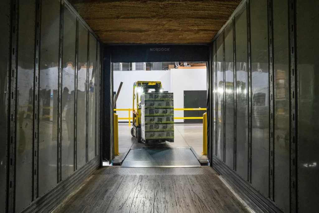 yellow an black forklift during daytime