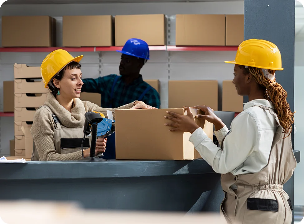 Fulfillment team scanning and packing a customer order