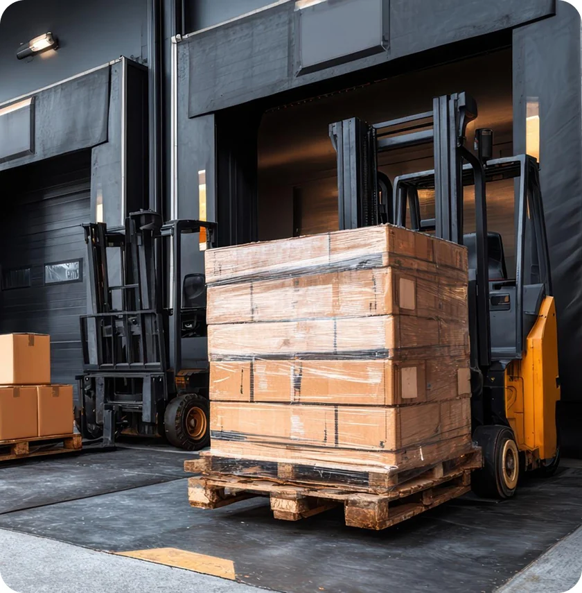 Warehouse forklifts moving palletized inventory for fulfillment
