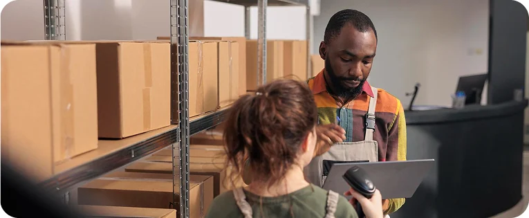 Warehouse staff checking inventory during order picking